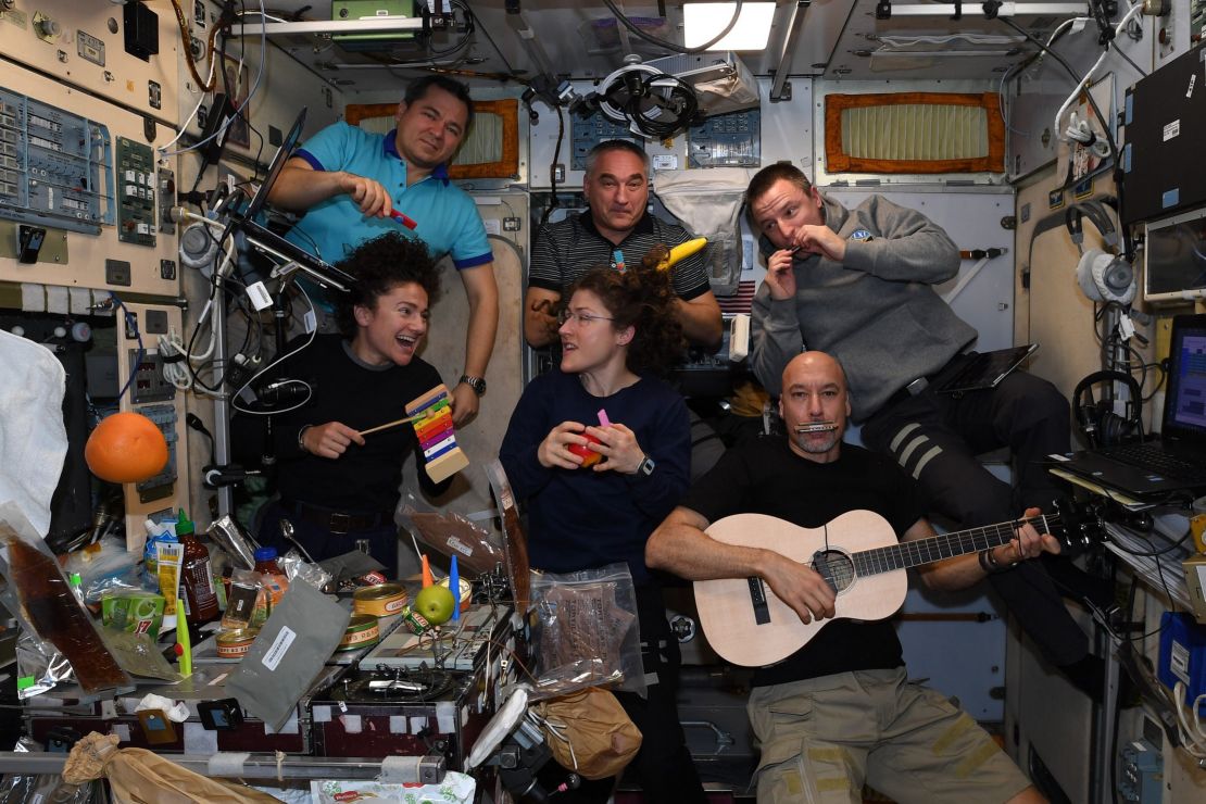 The crew formed a band to serenade mission control centers around the world.