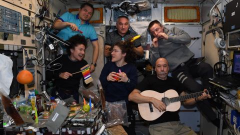 The crew formed a band to serenade mission control centers around the world.