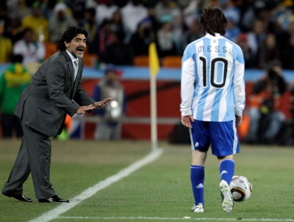 Maradona gives instructions to Argentina star Lionel Messi during a match at the 2010 World Cup.