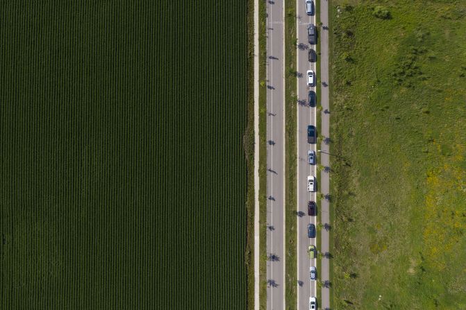 Drivers line up for a pop-up grocery event in Mankato, Minnesota, in July.