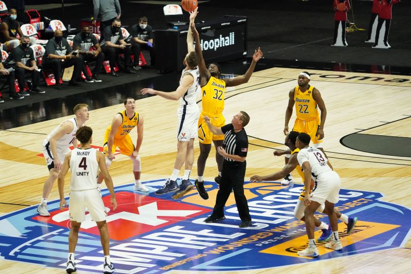 College basketball season tips off during coronavirus surge, with March Madness the ultimate goal