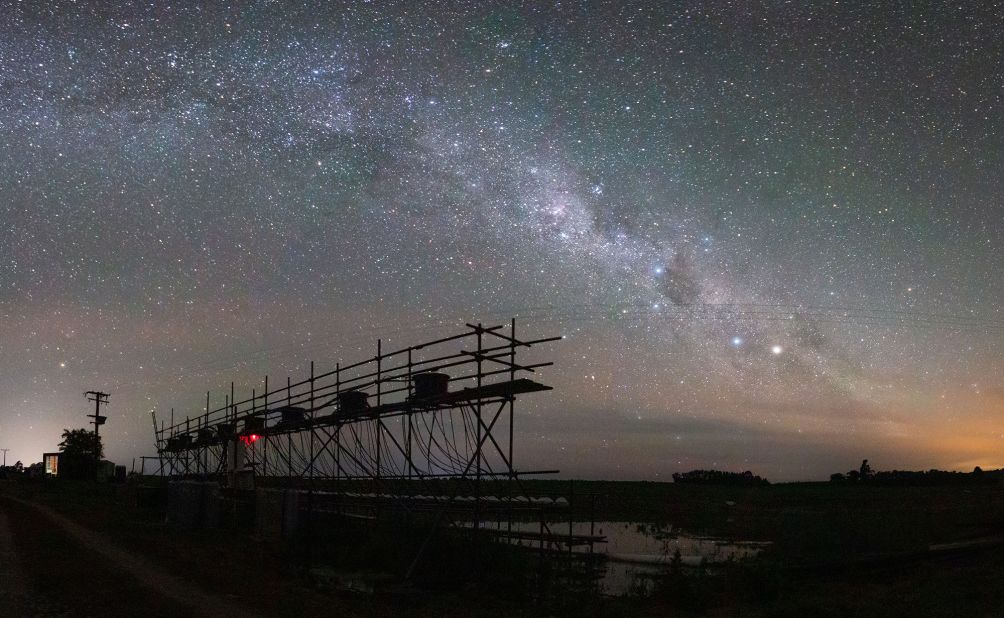 This panorama shot combines long-exposure photographs of the Milky Way.