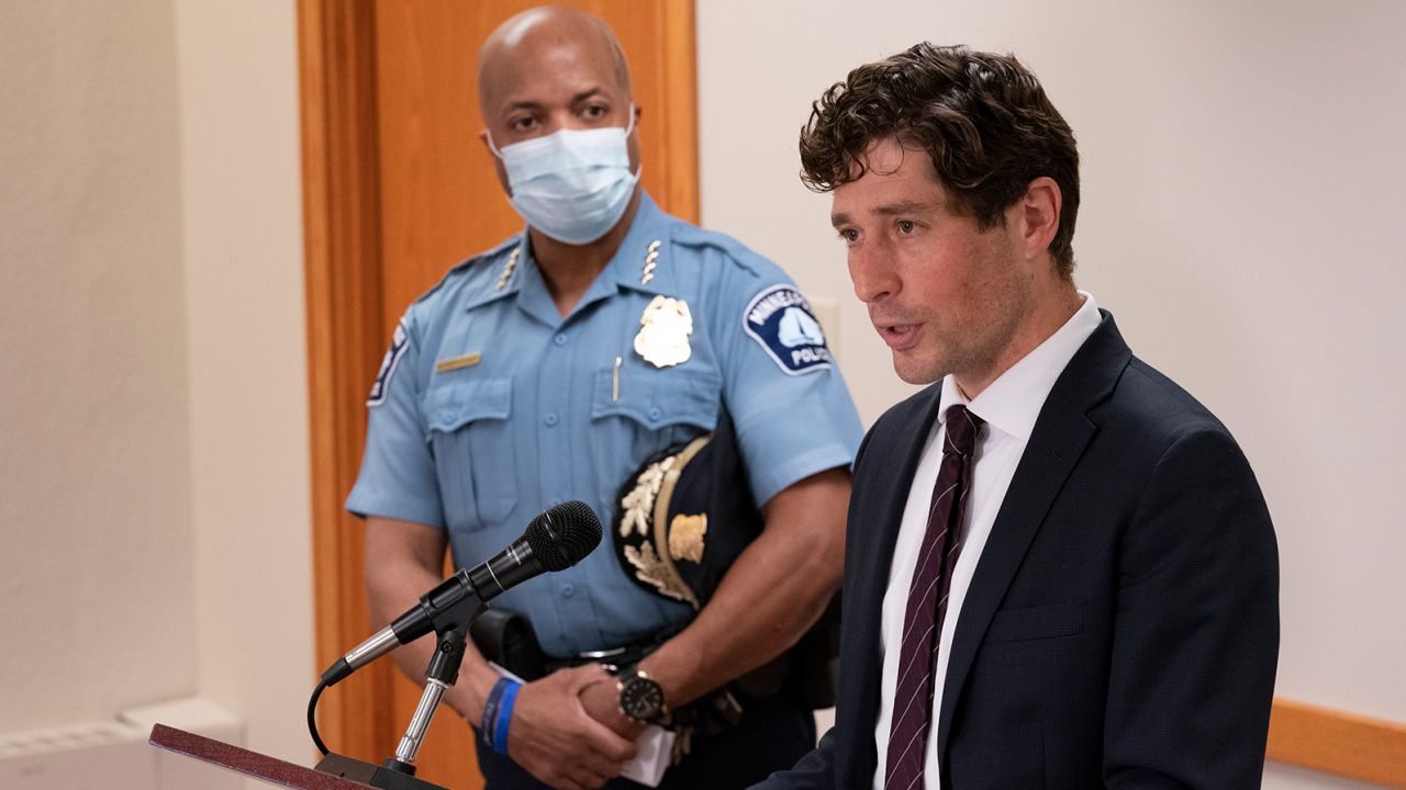 Minneapolis Mayor Jacob Frey, right, speaks at a news conference as Police Chief Medaria Arradondo listens on Wednesday, August 26, 2020, in Minneapolis.