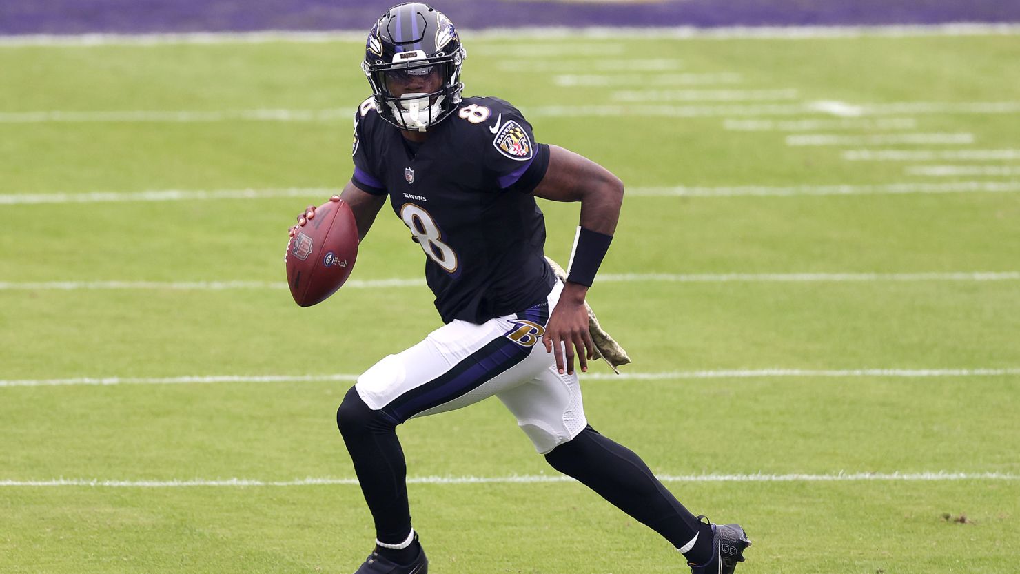 Baltimore Ravens quarterback Lamar Jackson drops back to pass against the Tennessee Titans on November 22, 2020. 