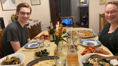 Paul's wife, Kathleen McGrath, and their son enjoy their Thanksgiving meal with a family Zoom call.