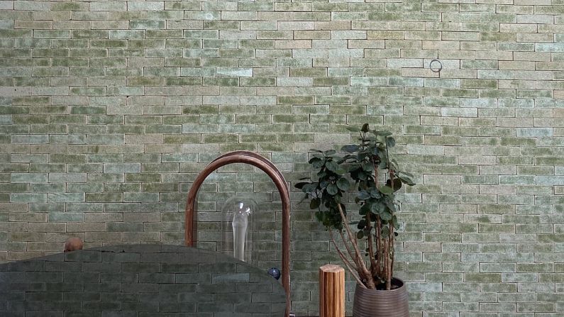 <a href="index.php?page=&url=https%3A%2F%2Fwww.stonecycling.com%2F" target="_blank" target="_blank">StoneyCycling's</a> customized bricks are used for high-end architecture projects around the globe, like this wasabi-colored facade for a private residence in The Netherlands. 