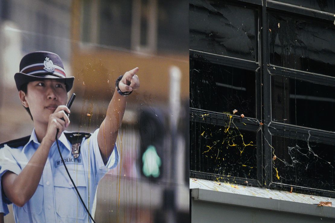 A poster of a policewoman is seen as protesters throw eggs and bricks outside a police station in the Tseung Kwan O district in Hong Kong on August 4, 2019.