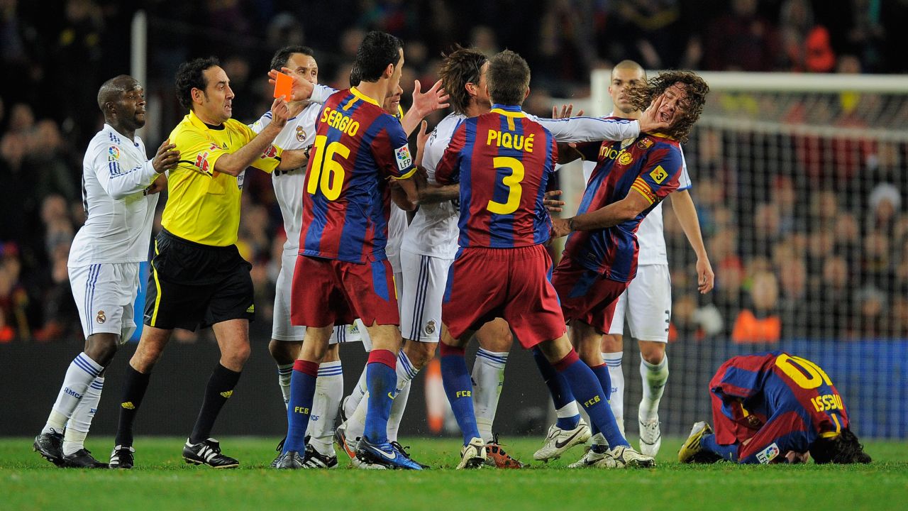 Sergio Ramos pushed Puyol in the face after a hacking tackle of Lionel Messi that saw him sent off. 