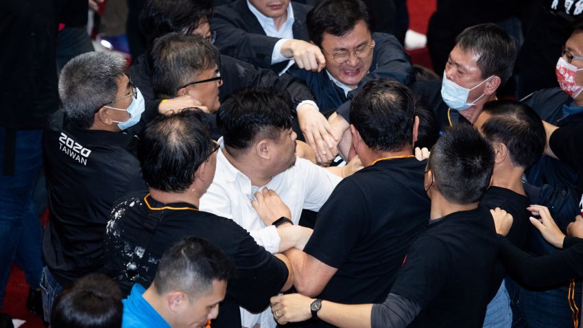 Fights break out after the pig offal being thrown in the parliament in Taipei, Taiwan, on 27 November 2020. (Photo by Annabelle Chih/NurPhoto via Getty Images)