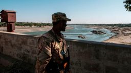 A member of the Amhara Special Forces watches on at the border crossing with Eritrea, in Humera, Ethiopia, on November 22, 2020. - Prime Minister Abiy Ahmed, last year's Nobel Peace Prize winner, announced military operations in Tigray on November 4, 2020, saying they came in response to attacks on federal army camps by the party, the Tigray People's Liberation Front (TPLF). 
Hundreds have died in nearly three weeks of hostilities that analysts worry could draw in the broader Horn of Africa region, though Abiy has kept a lid on the details, cutting phone and internet connections in Tigray and restricting reporting. (Photo by EDUARDO SOTERAS / AFP) (Photo by EDUARDO SOTERAS/AFP via Getty Images)