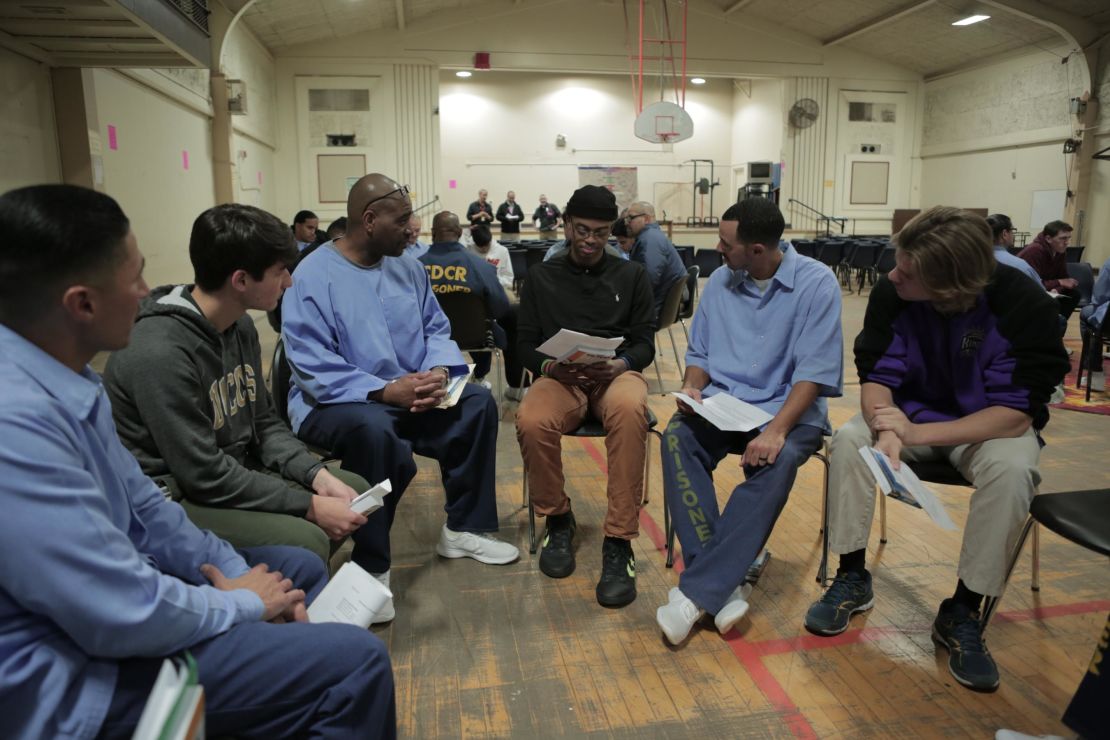 Sy Green, center, and Jason Bryant, right, participate in the reading group.