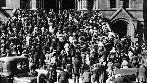 San Francisco: The congregation of the Cathedral of Saint Mary of the Assumption praying on the steps, where they gathered to hear mass and pray during the influenza pandemic of 1918.