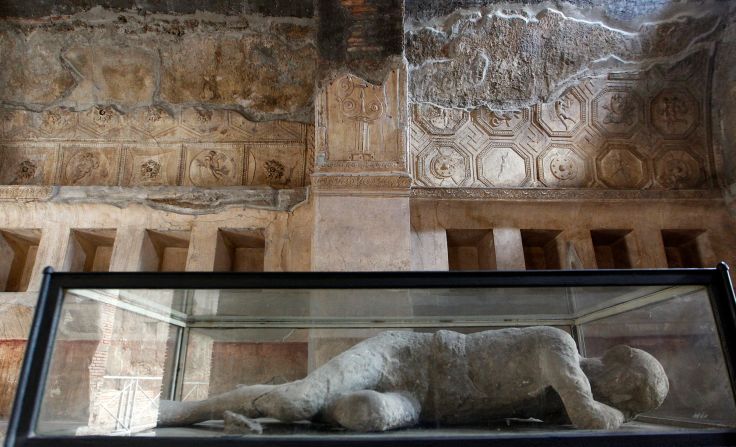 A plaster cast of the remains of a citizen of Pompeii who died in an eruption of Mount Vesuvius, about 2,000 years ago. Pompeii is Italy's top tourist attraction.