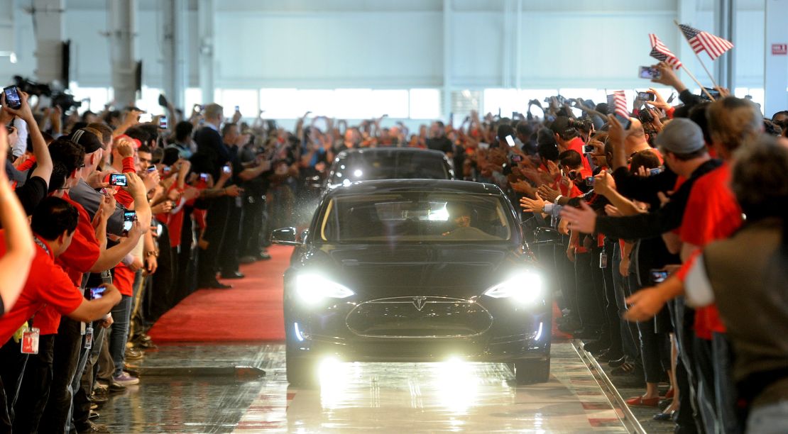 A customer drives a Model S out of Tesla's factory in Fremont, California on June 22, 2012.