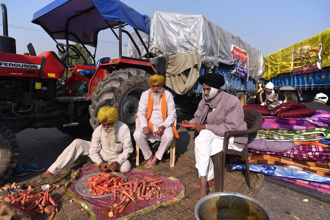 Farmers prepare food during day five of protests over farm reform laws at Singhu border on November 30, 2020 in New Delhi, India.