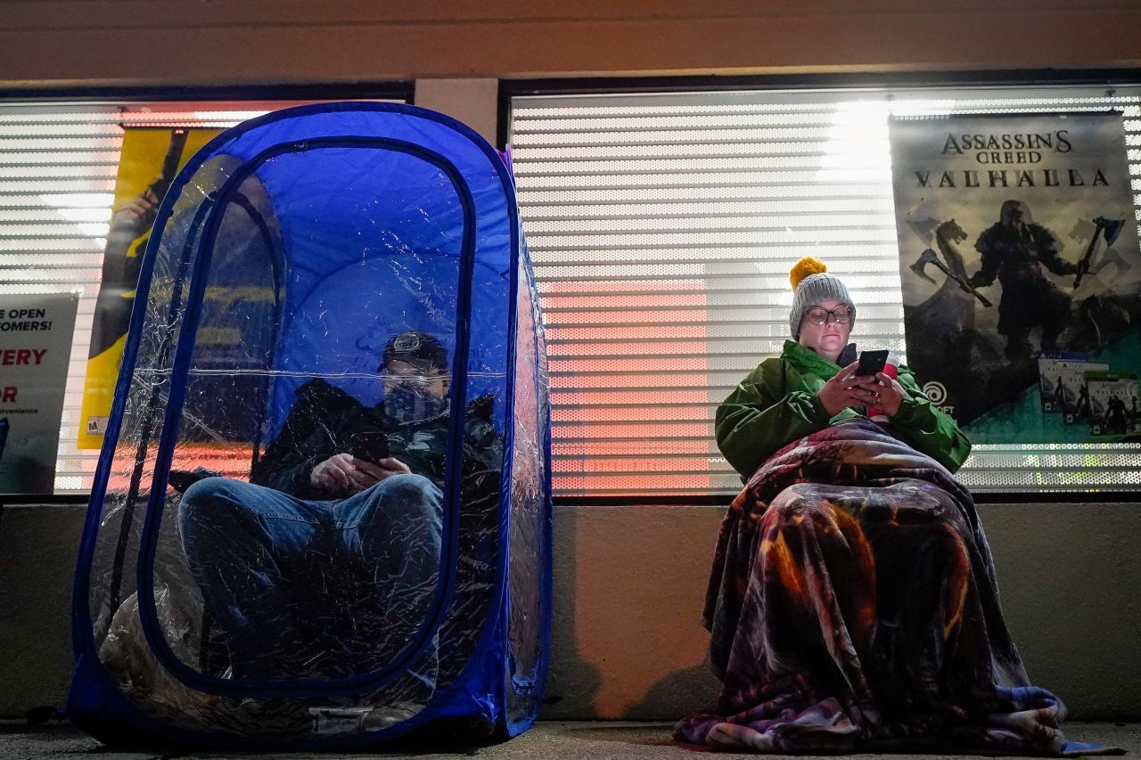 Black Friday shoppers wait in line eight hours prior to a game store's opening in La Grange, Kentucky, on November 26.