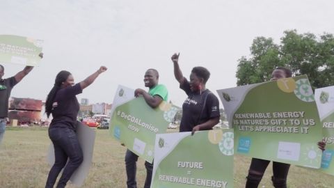 Campaigners draw public attention to Chibeze Ezekiel's movement on the dangers of coal and the need for renewables at a shopping mall in Accra, Ghana in September 2017.