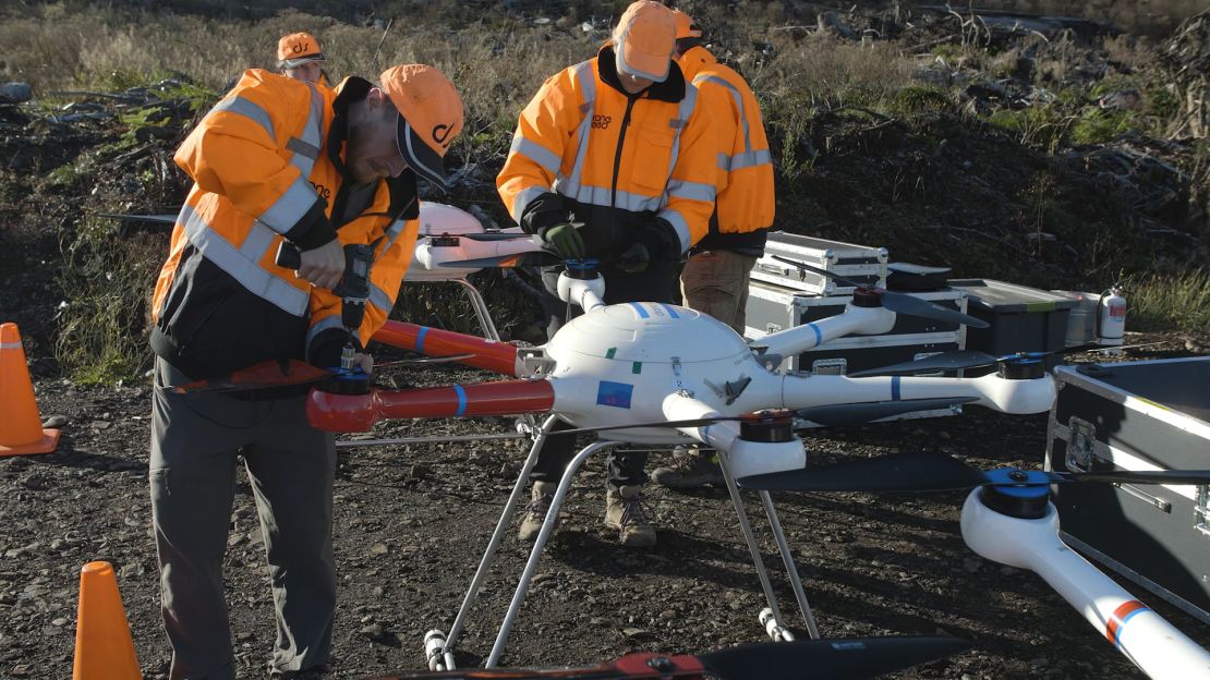 The eight-foot drones are capable of carrying up to 57 pounds worth of seeds. 