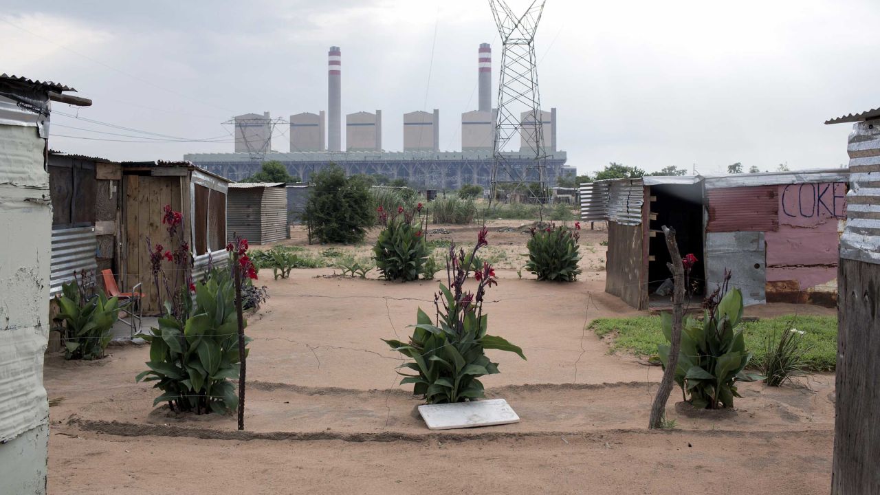 Many people have moved in from rural areas and neighboring Zimbabwe to find work at the Medupi coal power plant, pictured here from Maropong township outside Lephalele, South Africa in January 2015. 