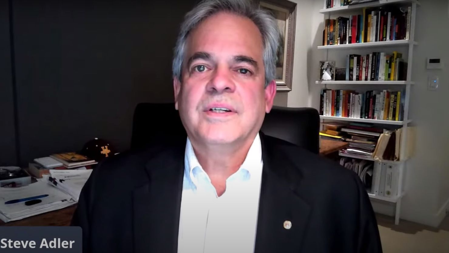 Mayor Steve Adler of Austin, Texas, apologized after advising against travel while he was in Mexico.