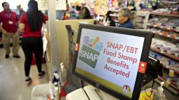 "SNAP/EBT Food Stamp Benefits Accepted" is displayed on a screen inside a Family Dollar Stores Inc. store in Chicago, Illinois, U.S., on Tuesday, March 3, 2020. Dollar Tree Inc. released earnings figures on March 4. Photographer: Daniel Acker/Bloomberg via Getty Images