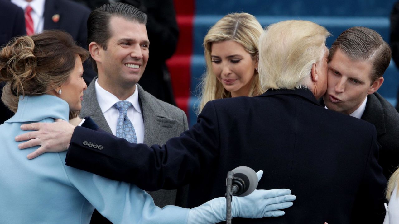 President Donald Trump kisses his son Eric Trump after his inauguration on January 20, 2017 in Washington, DC.