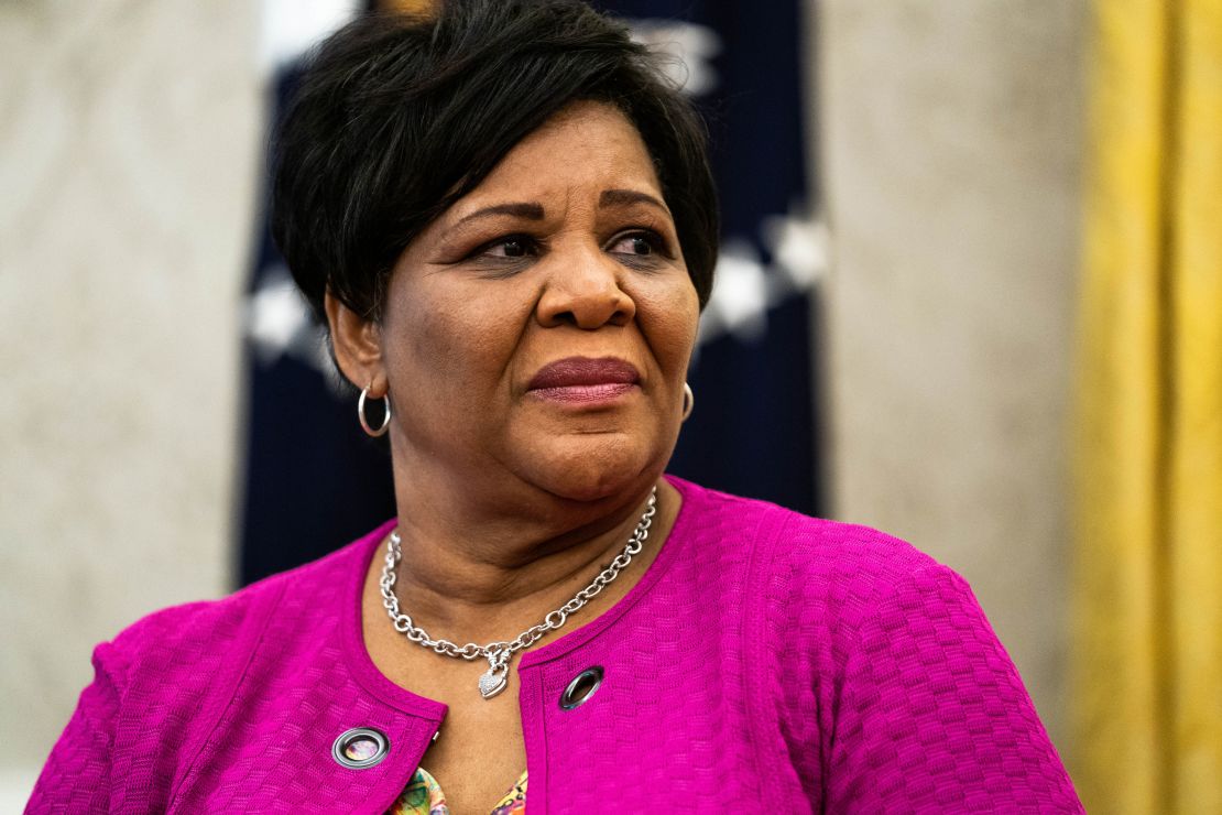 Alice Marie Johnson listens as President Donald Trump announces her full pardon at the White House in Washington, DC.