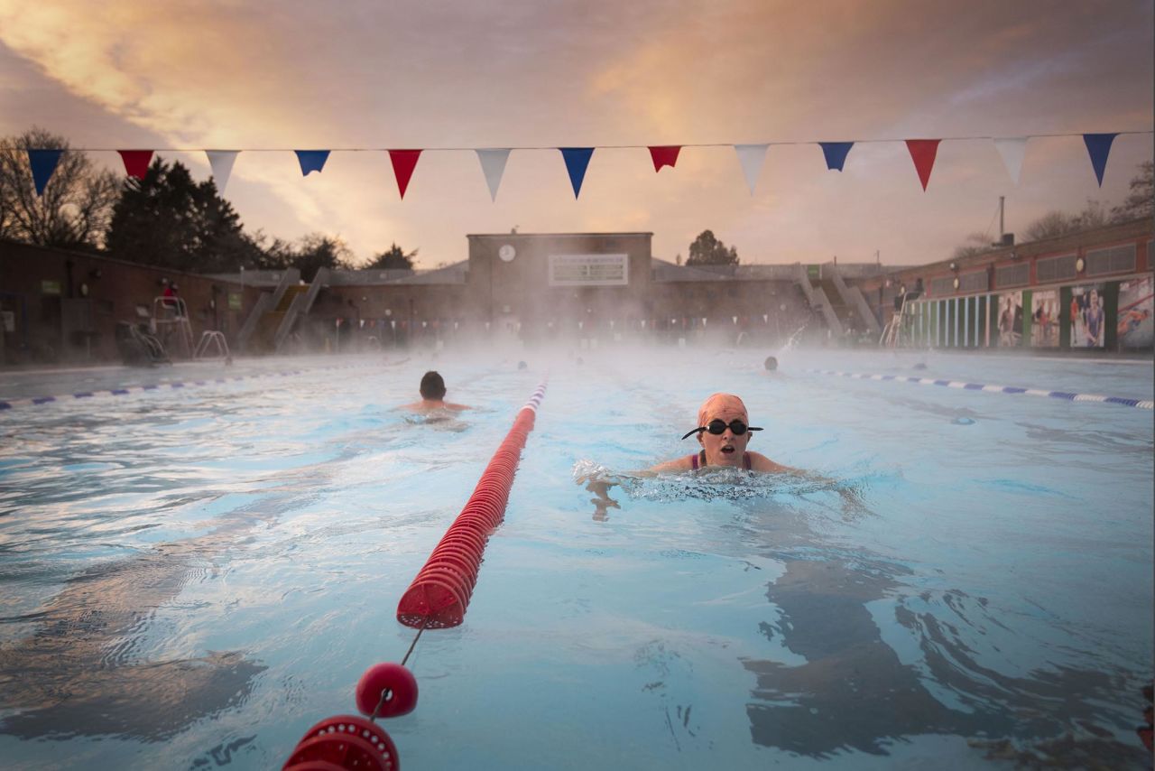 Early morning swimmers enjoy the water at the Charlton Lido in London on Wednesday, December 2. It had just reopened after the end of a second national lockdown.