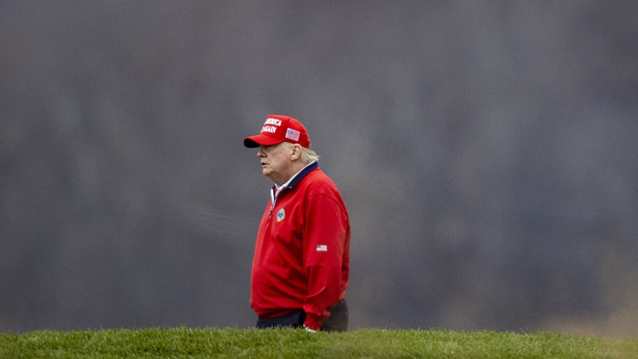 US President Donald Trump plays golf at his golf club in Sterling, Virginia, on Friday, November 27.