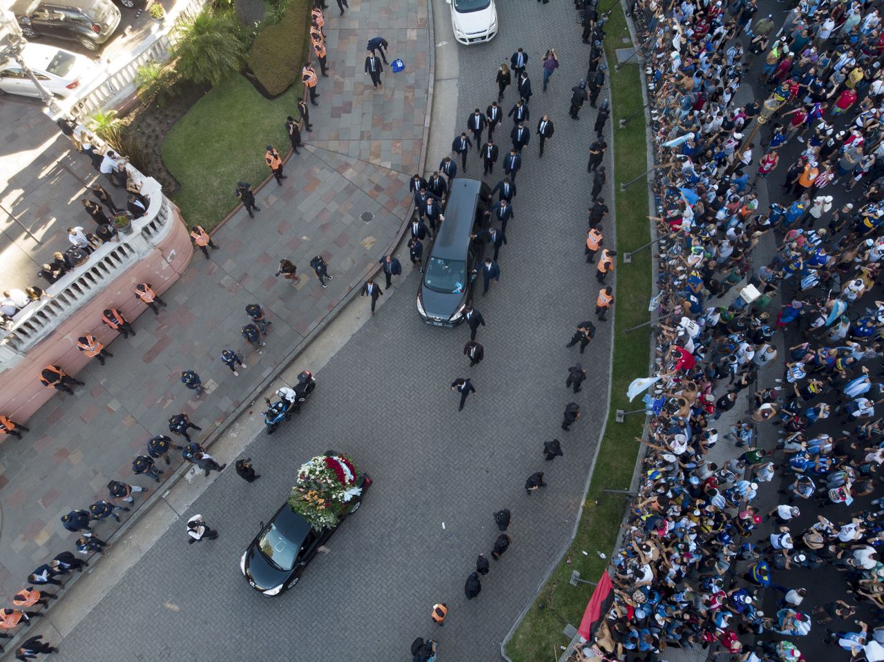 A hearse carries the casket of <a href="https://www.cnn.com/2020/11/25/football/gallery/diego-maradona/index.html" target="_blank">soccer legend Diego Maradona</a> past the government house in Buenos Aires on Thursday, November 26. Maradona, one of the all-time greats who captained Argentina to victory at the 1986 World Cup, died at the age of 60.
