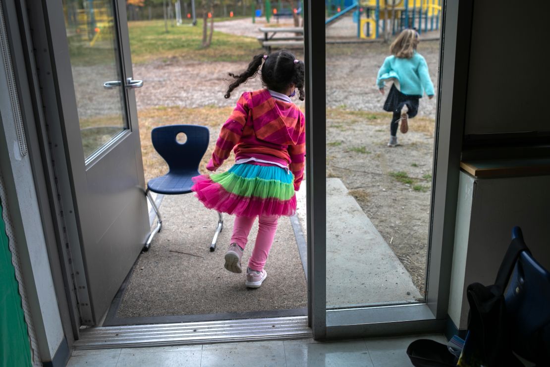 Kindergarten students race outside for a break in Stamford, Connecticut. The social and emotional learning at school is key as is academic growth.