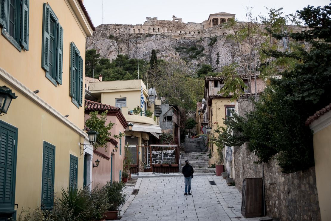 Informal workers are falling through social safety nets, particularly in sectors such as tourism. Pictured, the Acropolis in Athens on November 12 during Greece's second lockdown.