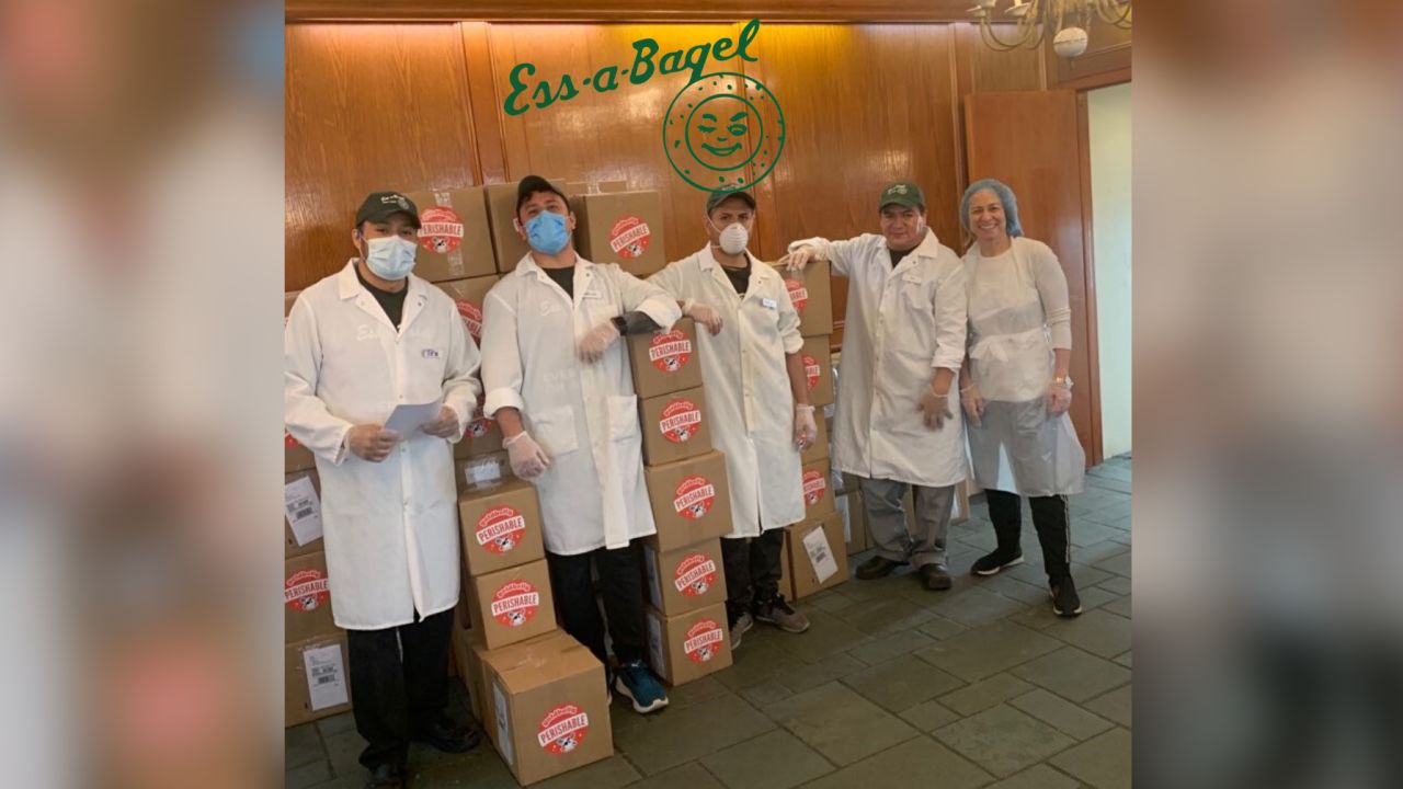 Employees of Ess-a-Bagel posing for a photo early on in the pandemic with Goldbelly boxes. 