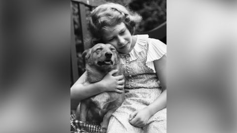 Princess Elizabeth, aged 10, pictured here with one of her dogs