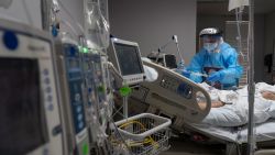 HOUSTON, TX - NOVEMBER 10: (EDITORIAL USE ONLY) A medical staff member treats a patient suffering from coronavirus in the COVID-19 intensive care unit (ICU) at the United Memorial Medical Center (UMMC) on November 10, 2020 in Houston, Texas. According to reports, COVID-19 infections are on the rise in Houston, as the state of Texas has reached over 1,030,000 cases, including over 19,000 deaths.  (Photo by Go Nakamura/Getty Images)