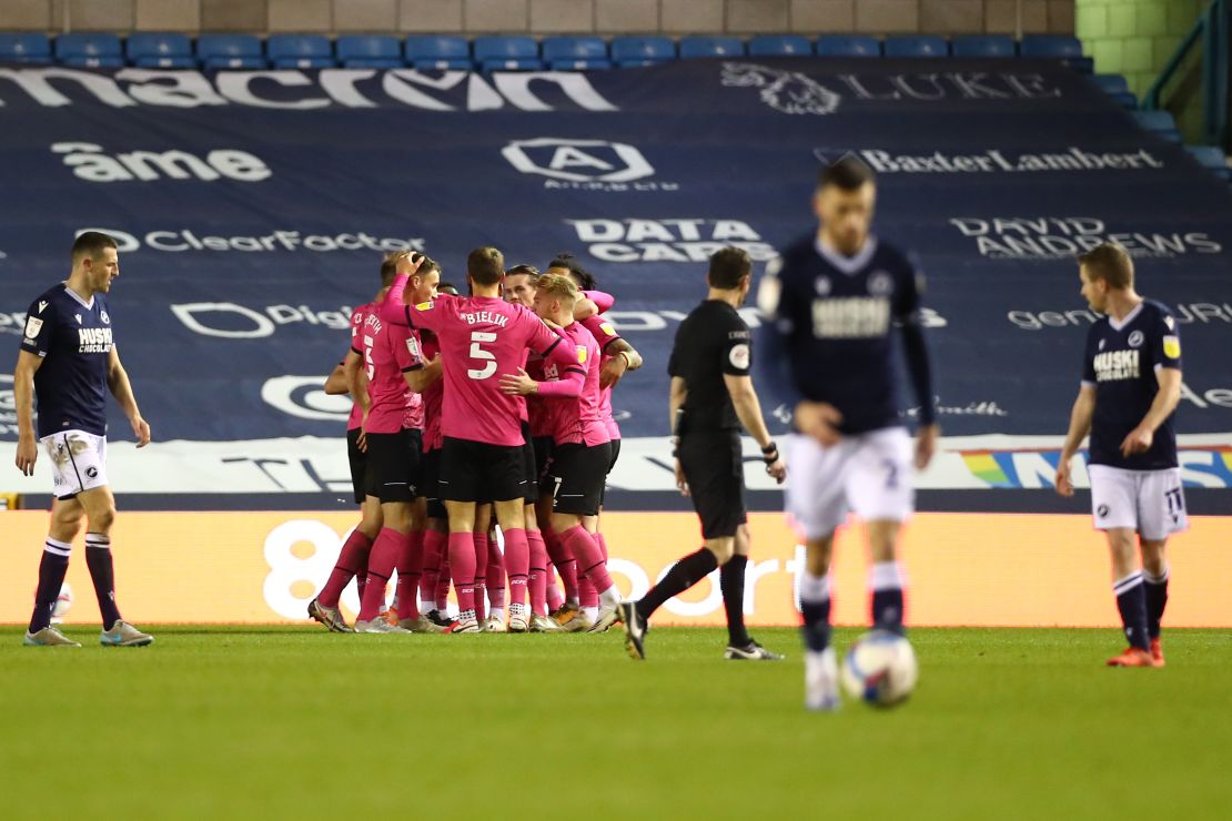 Derby celebrates scoring against Millwall.