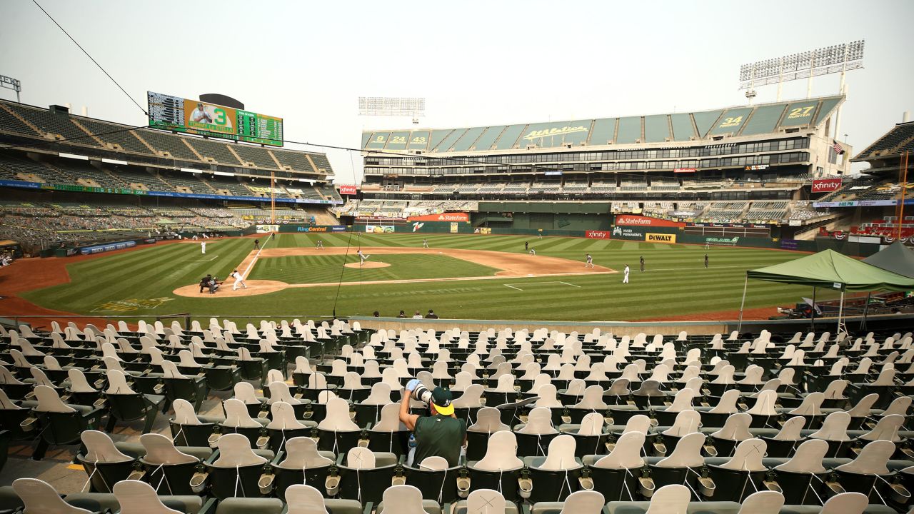 PHOTOS: Fans return to Oakland Coliseum to cheer on A's