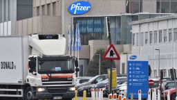 A temperature controlled cold storage haulage truck leaves the Pfizer Inc. facility in Puurs, Belgium, on Thursday, Dec. 3, 2020. The quick approval of Pfizer Inc.s coronavirus vaccine in the U.K. isnt likely to accelerate the availability of the shot in Asia, as countries work to complete local safety tests and negotiate deals.