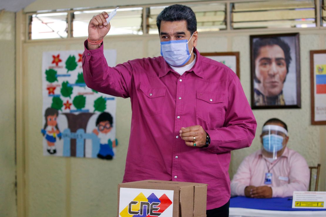Maduro shows his ballot on Sunday, Dec. 6, 2020. 