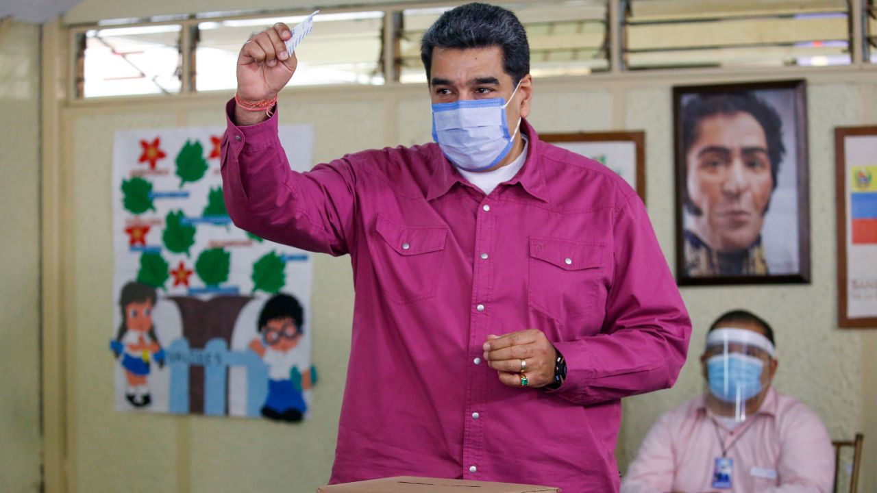 Venezuela's President Nicolas Maduro shows his ballot at the weekend elections, ahead of a competing referendum by the opposition this week.