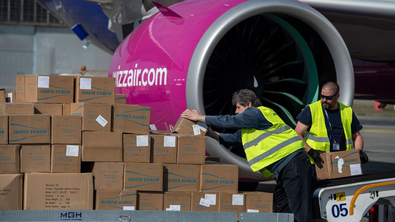 Workers unload boxes of PPE from an airplane arriving in Budapest, Hungary from China, back in April 2020.