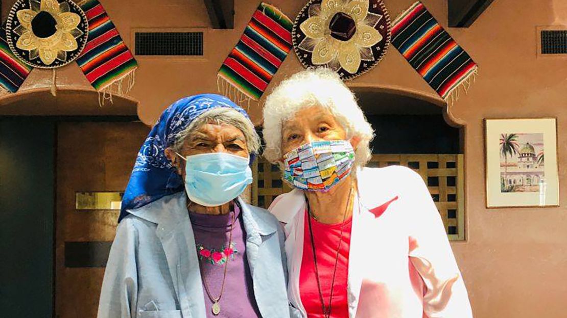 Elizabeth Havier, 89 and Sarah Parvello, 80, of the Tohono O'odham Nation in Arizona, wearing masks donated through Protect Native Elders. The mask on the left was made by Fiat Chrysler. Automobiles.