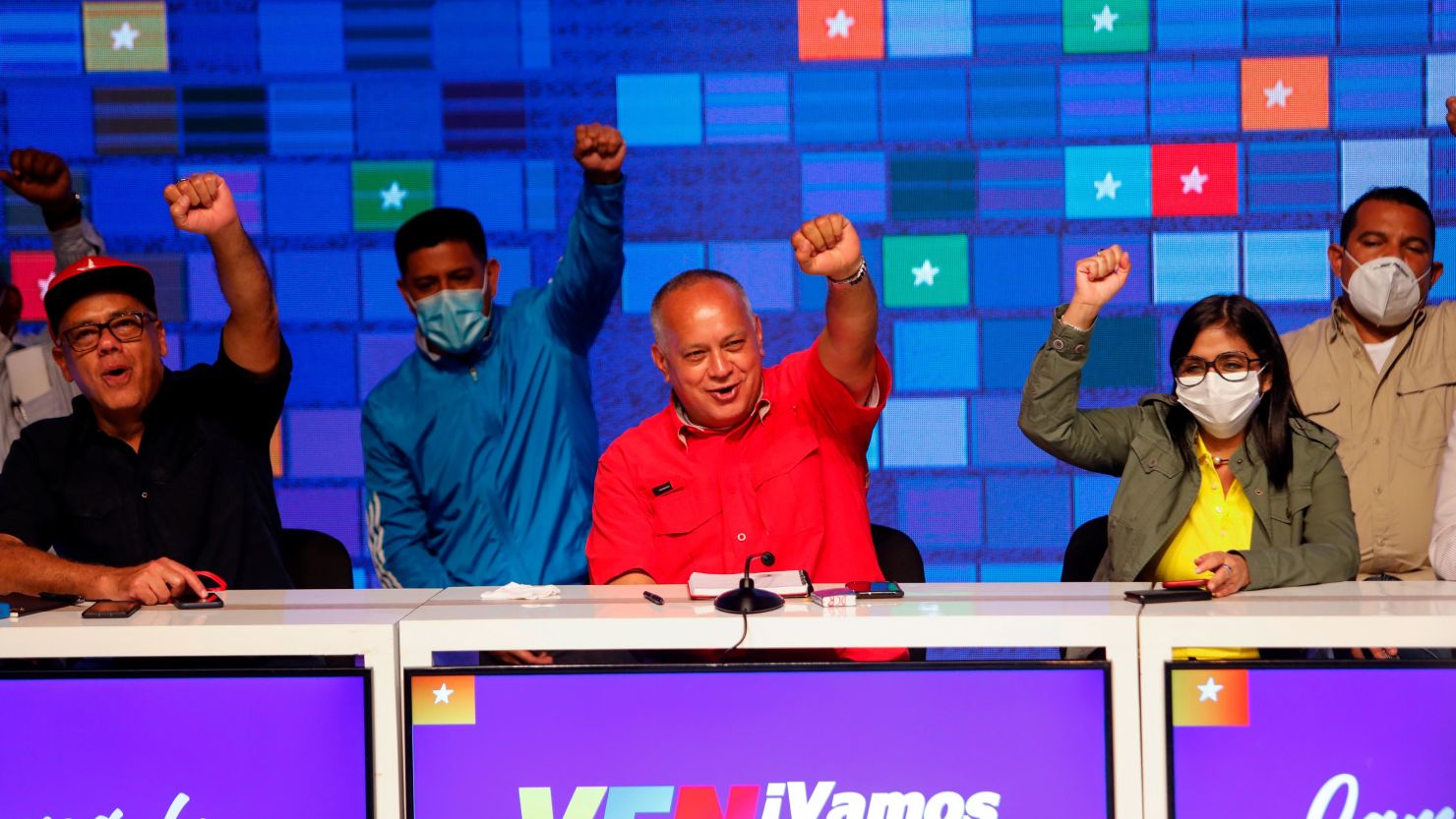 Members of Venezuela's United Socialist Party of Venezuela celebrate after parliamentary elections on December 7 in Caracas.