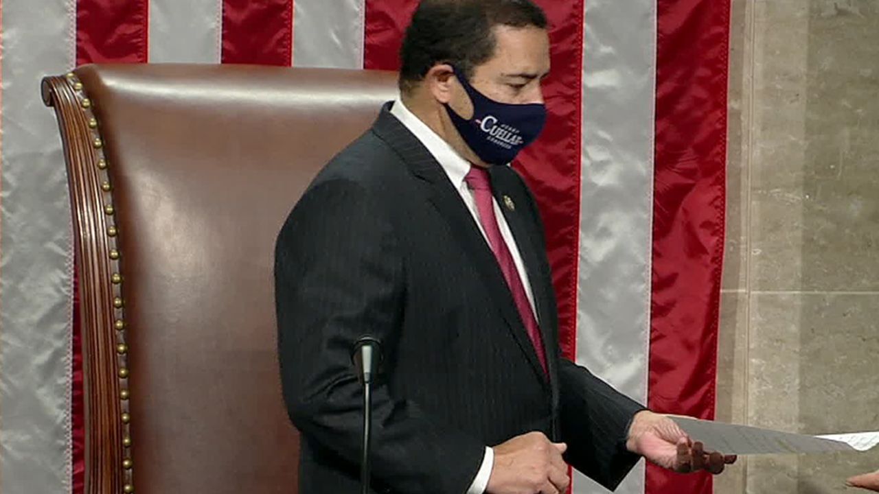 US Rep. Henry Cueller wears a face mask December 3 on the House floor.