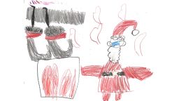 A drawing of Santa Claus with a mask on by Willow Swanson, 6, of Atlanta, Georgia.