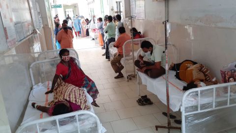 Patients and their bystanders are seen at the district government hospital in Eluru, Andhra Pradesh state, India, Sunday, Dec.6, 2020. Over 200 people have been hospitalized due to an unidentified illness in this ancient city famous for its hand woven products. (AP Photo)