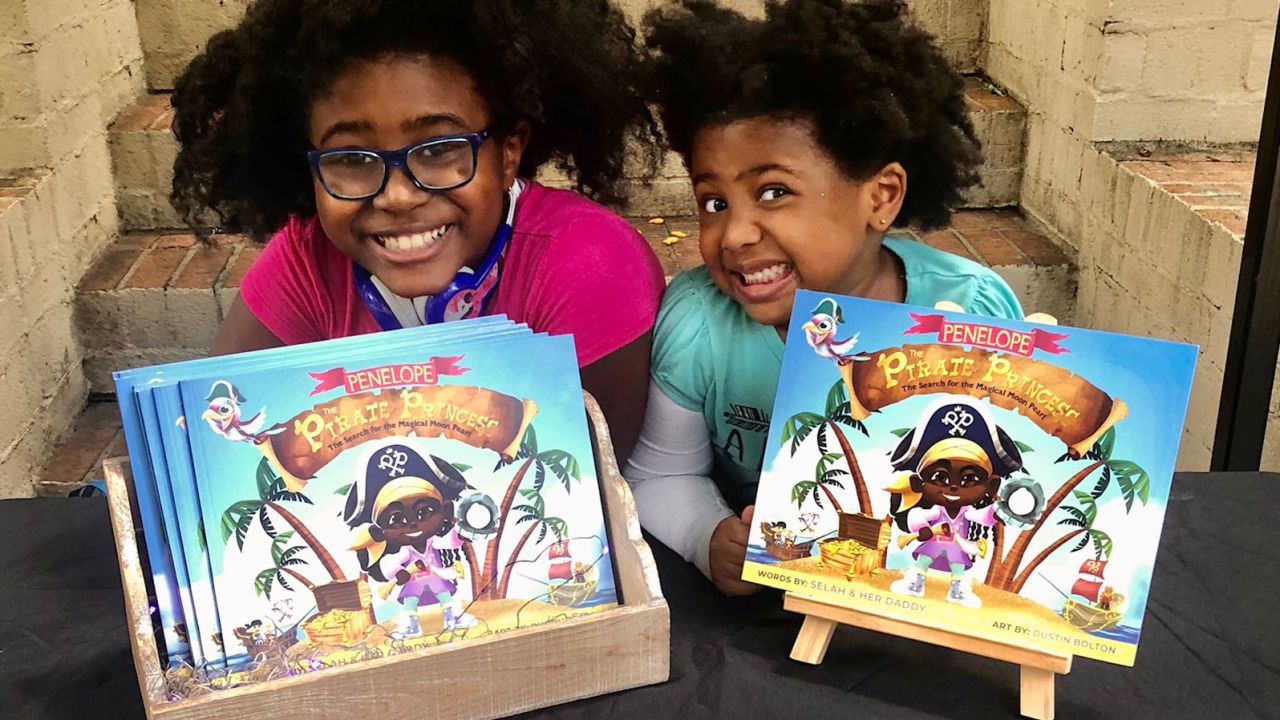 Selah with her younger sister and co-author Syrai.