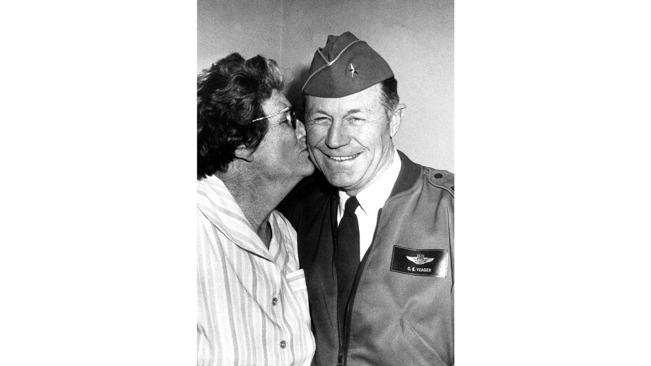Susie Yeager plants a kiss on the cheek of her supersonic son, Brig. Gen. Chuck Yeager in1973.