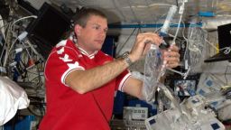 Danish Astronaut Andreas Mogensen performing the first aquaporin membrane experiment on the International Space Station on September 2015.