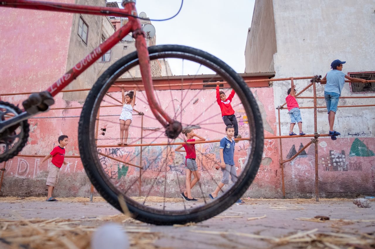 When an injury ended his breakdancing career in 2013, he picked up his camera and began capturing his hometown. Here, as a temporary sheep market was being dismantled, the local children transform the metal structures of the tents into a playground. 